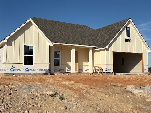 106 Skyline Dr, Glen Rose, TX 76043 - view of front of home featuring board and batten siding, a shingled roof, and a garage