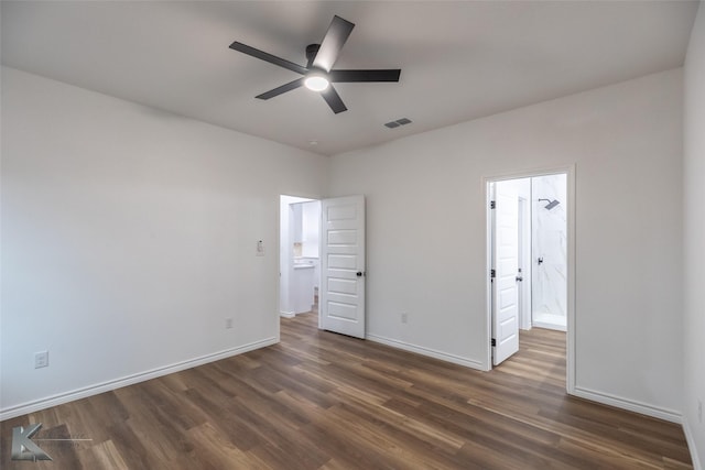 unfurnished bedroom with baseboards, visible vents, and wood finished floors