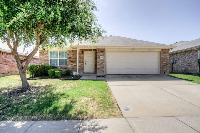 single story home with a front yard, an attached garage, brick siding, and driveway