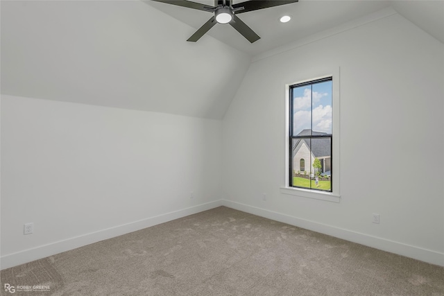 bonus room with baseboards, carpet floors, and vaulted ceiling