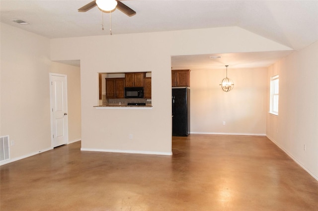 unfurnished living room with concrete floors, visible vents, baseboards, and ceiling fan with notable chandelier