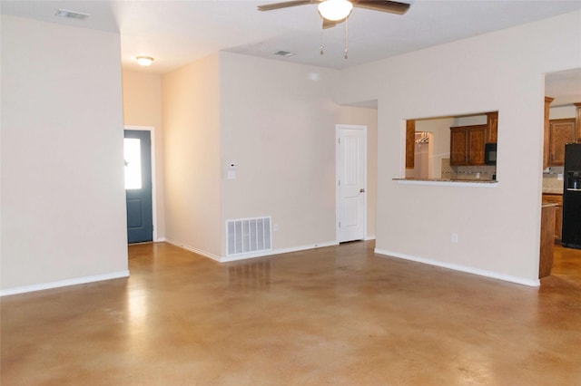 unfurnished living room featuring finished concrete floors, ceiling fan, and visible vents