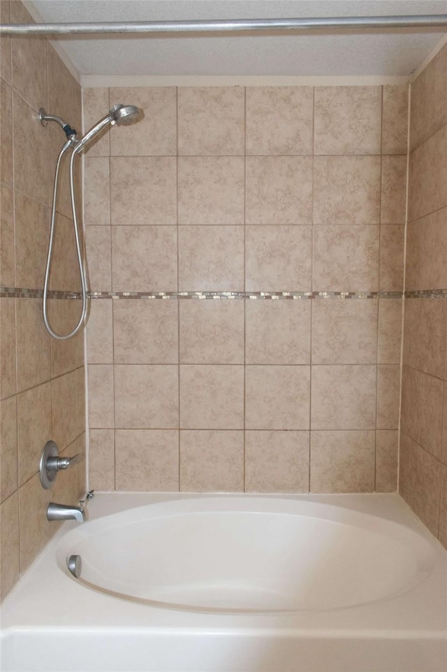 bathroom featuring bathing tub / shower combination