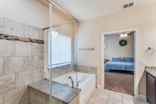 3530 Beaumont Dr, Wylie, TX 75098 - full bathroom with ensuite bath, a bath, vanity, tile patterned floors, and a ceiling fan