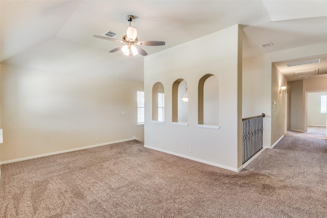 3530 Beaumont Dr, Wylie, TX 75098 - carpeted spare room with plenty of natural light, ceiling fan, baseboards, lofted ceiling, and attic access