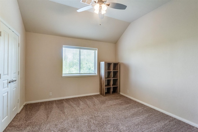 3530 Beaumont Dr, Wylie, TX 75098 - empty room with carpet floors, vaulted ceiling, a ceiling fan, and baseboards