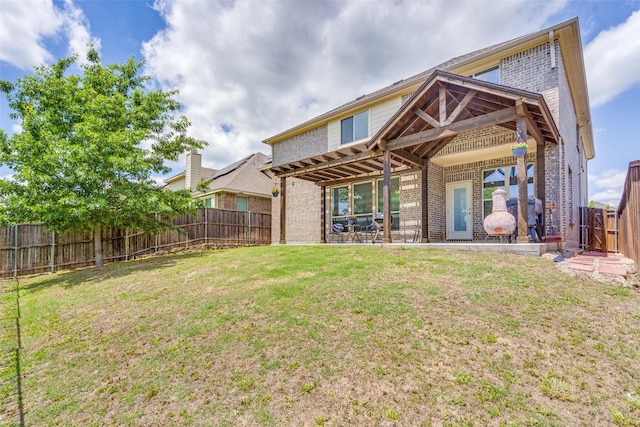 3530 Beaumont Dr, Wylie, TX 75098 - back of house featuring brick siding and a patio area