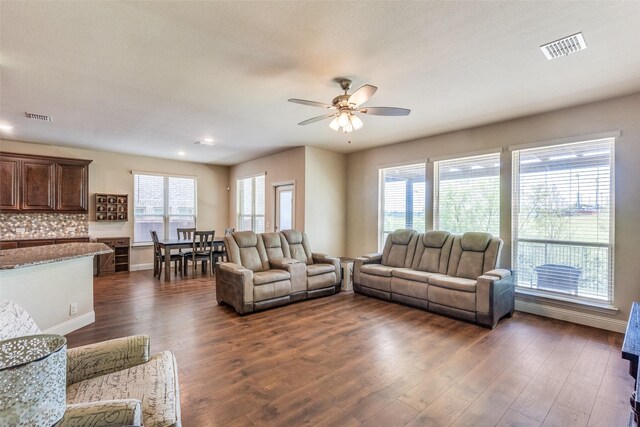 3530 Beaumont Dr, Wylie, TX 75098 - living area featuring dark wood finished floors, a ceiling fan, baseboards, and recessed lighting