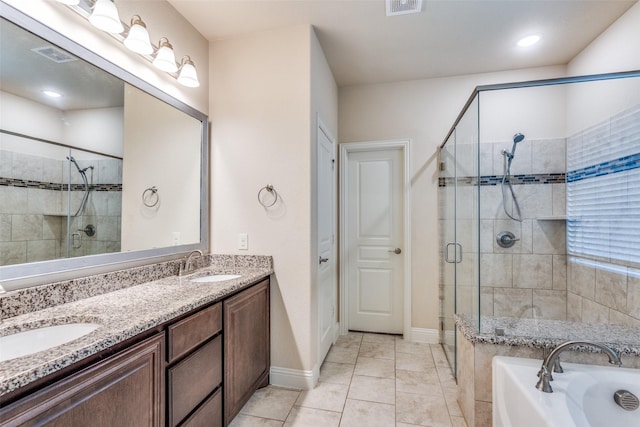 3530 Beaumont Dr, Wylie, TX 75098 - bathroom with a stall shower, double vanity, a bath, tile patterned floors, and baseboards