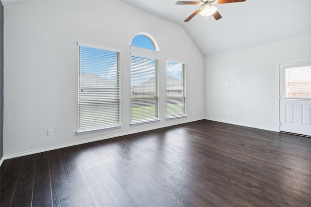 1112 Crest Ridge Dr, Glenn Heights, TX 75154 - unfurnished room featuring vaulted ceiling, a ceiling fan, dark wood-type flooring, and baseboards