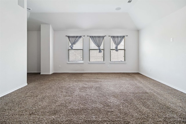 1112 Crest Ridge Dr, Glenn Heights, TX 75154 - spare room featuring vaulted ceiling, carpet flooring, and baseboards