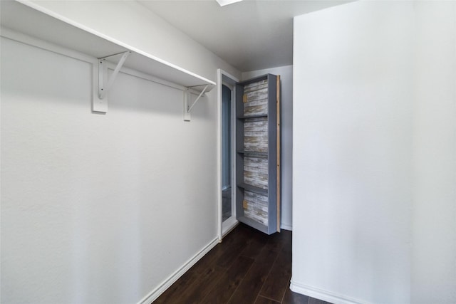 1112 Crest Ridge Dr, Glenn Heights, TX 75154 - walk in closet featuring dark wood-style flooring