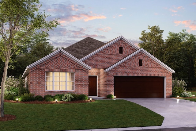 single story home with driveway, brick siding, a front lawn, and an attached garage