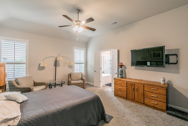 1725 Bellatrix Dr, Haslet, TX 76052 - bedroom featuring baseboards, ensuite bath, ceiling fan, vaulted ceiling, and light carpet
