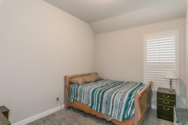 1725 Bellatrix Dr, Haslet, TX 76052 - carpeted bedroom featuring vaulted ceiling and baseboards