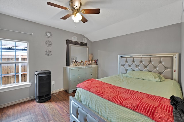 7810 Maxwell Ave, Dallas, TX 75217 - bedroom featuring ceiling fan, lofted ceiling, baseboards, and dark wood finished floors