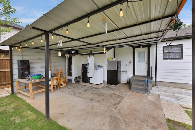 7810 Maxwell Ave, Dallas, TX 75217 - view of patio with separate washer and dryer and fence