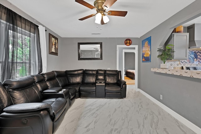 7810 Maxwell Ave, Dallas, TX 75217 - living area with baseboards, a ceiling fan, marble finish floor, and visible vents