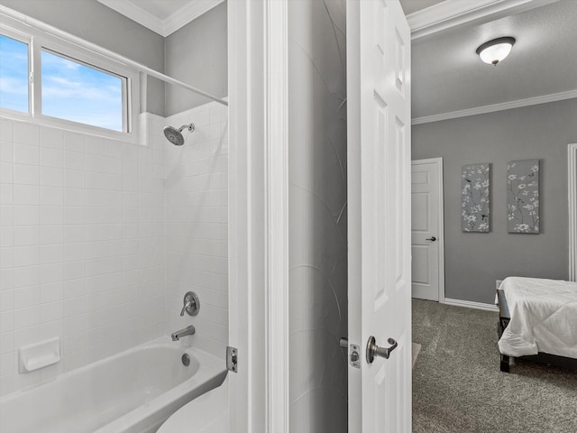 full bathroom featuring bathing tub / shower combination, ornamental molding, and baseboards