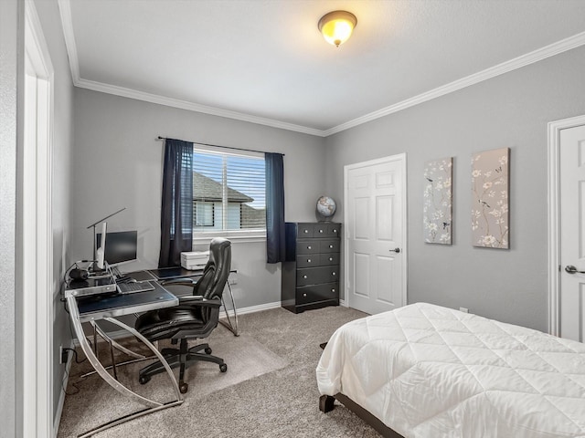 bedroom featuring baseboards, carpet flooring, and crown molding