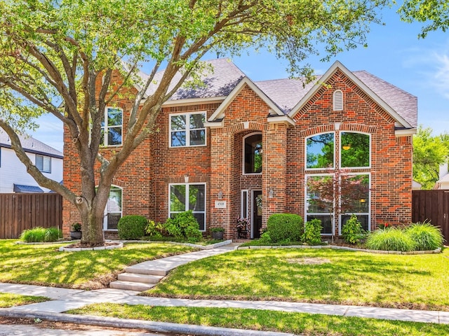 4308 Echo Bluff Dr, Plano, TX 75024 - traditional home featuring brick siding and a shingled roof