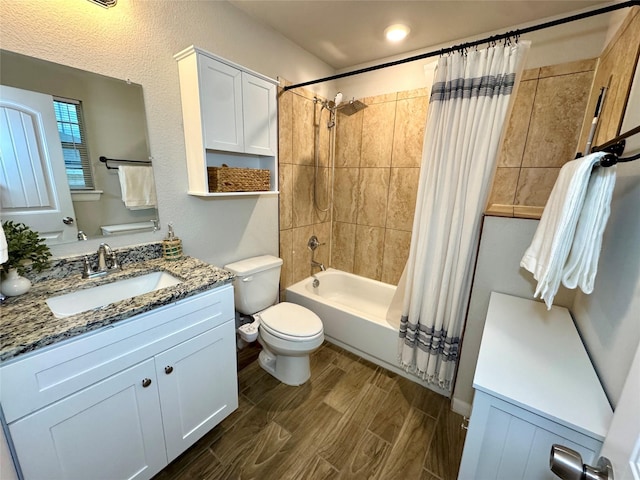 124 Oakwood St, Chico, TX 76431 - full bathroom featuring toilet, vanity, shower / bath combo with shower curtain, and wood finished floors