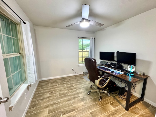 124 Oakwood St, Chico, TX 76431 - office area with wood finished floors, baseboards, and ceiling fan