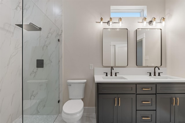 full bath with toilet, a sink, and a marble finish shower