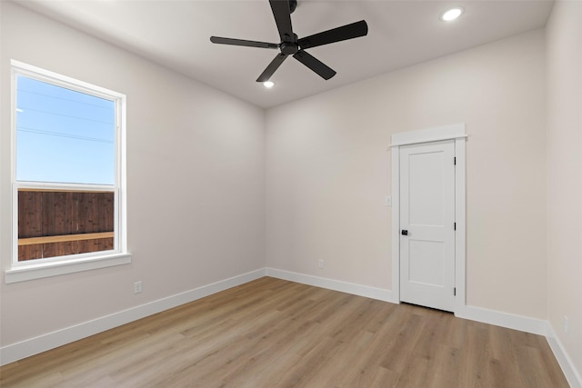 unfurnished room featuring ceiling fan, recessed lighting, baseboards, and light wood-style floors