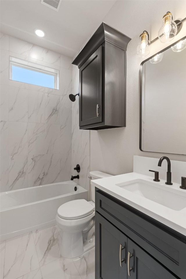 bathroom with toilet, marble finish floor, visible vents, vanity, and bathtub / shower combination