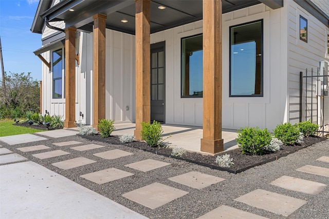property entrance with board and batten siding