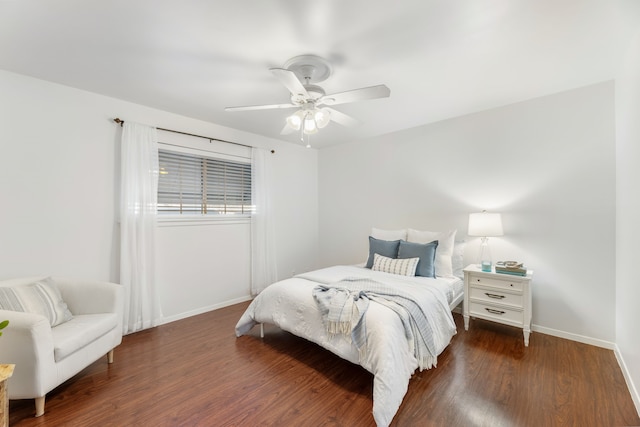 7908 Royal Ln Unit 122B, Dallas, TX 75230 - bedroom with ceiling fan, baseboards, and wood finished floors