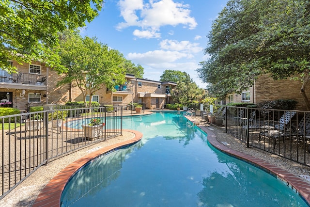 7908 Royal Ln Unit 122B, Dallas, TX 75230 - pool with fence