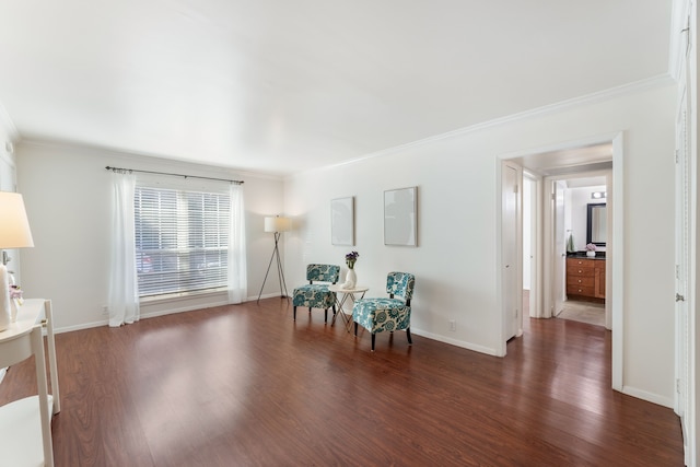 7908 Royal Ln Unit 122B, Dallas, TX 75230 - sitting room featuring ornamental molding, baseboards, and wood finished floors