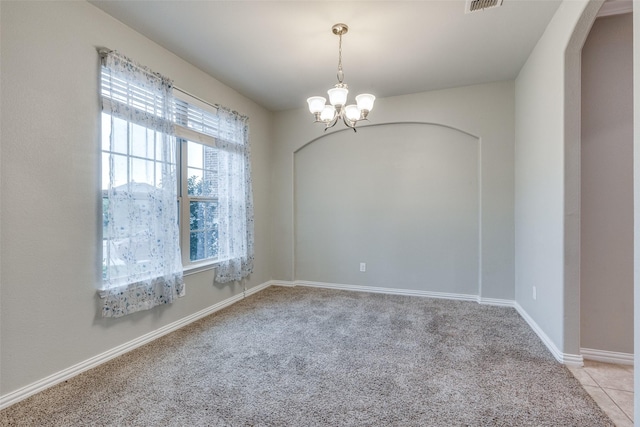 14629 Gilley Ln, Fort Worth, TX 76052 - spare room featuring light colored carpet, an inviting chandelier, arched walkways, and baseboards