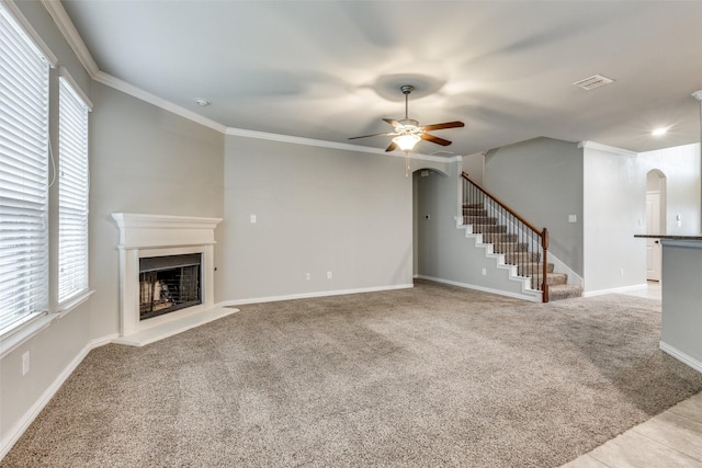 14629 Gilley Ln, Fort Worth, TX 76052 - unfurnished living room with arched walkways, a healthy amount of sunlight, ceiling fan, and a fireplace with raised hearth
