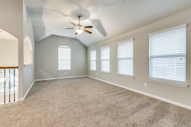 14629 Gilley Ln, Fort Worth, TX 76052 - empty room featuring carpet flooring, a wealth of natural light, vaulted ceiling, and a ceiling fan