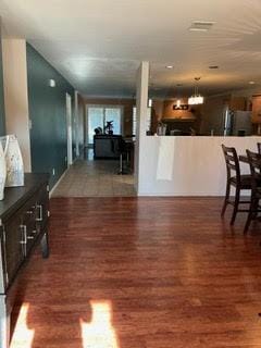 1804 Chicory Ln, Arlington, TX 76010 - living area with wood finished floors and a chandelier