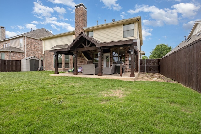 1804 Goodnight Ln, Allen, TX 75002 - rear view of property with a patio, a storage unit, a chimney, an outbuilding, and brick siding