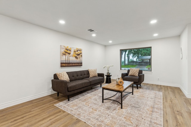 6200 Ravenswood Dr, Fort Worth, TX 76112 - living room with light wood-type flooring, recessed lighting, and baseboards
