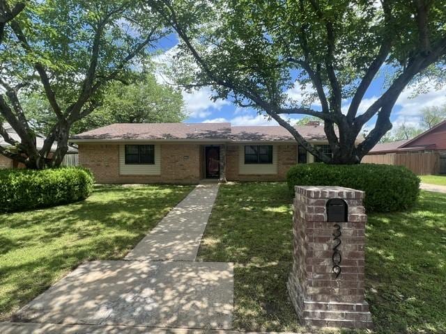 3209 Mimosa Dr, Sherman, TX 75092 - ranch-style home with brick siding