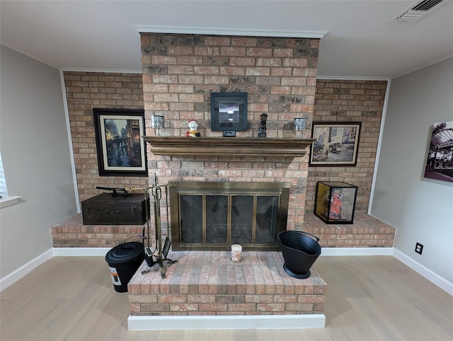 3209 Mimosa Dr, Sherman, TX 75092 - living room with wood finished floors, a fireplace, crown molding, and baseboards
