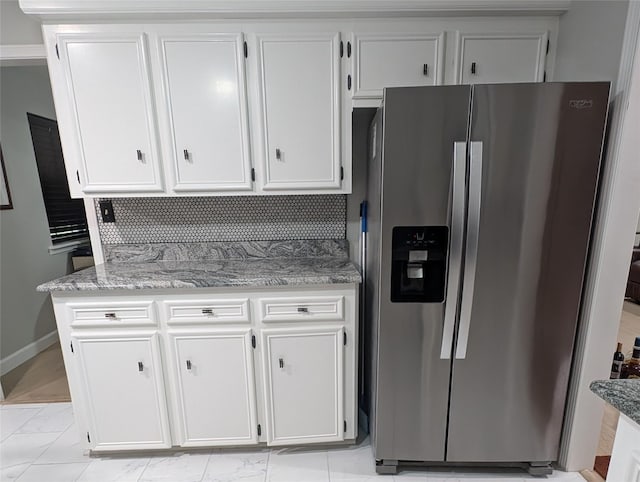 3209 Mimosa Dr, Sherman, TX 75092 - kitchen with light stone countertops, white cabinetry, stainless steel fridge, and marble finish floor