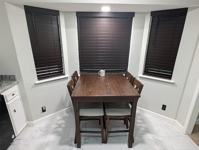 3209 Mimosa Dr, Sherman, TX 75092 - dining space with light marble finish flooring and baseboards