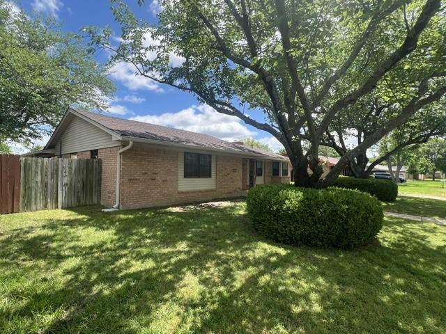3209 Mimosa Dr, Sherman, TX 75092 - view of property exterior with brick siding