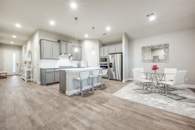 2100 Blackcap St, Denton, TX 76205 - kitchen featuring recessed lighting, gray cabinetry, baseboards, visible vents, and appliances with stainless steel finishes