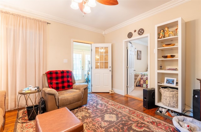 1501 W Crawford St W, Denison, TX 75020 - living area with a ceiling fan, ornamental molding, and wood finished floors