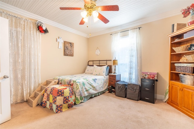 1501 W Crawford St W, Denison, TX 75020 - bedroom featuring crown molding, light carpet, and a ceiling fan