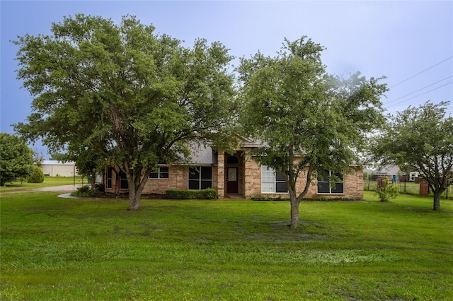 10020 Richard Cir, Forney, TX 75126 - view of property hidden behind natural elements featuring a front lawn