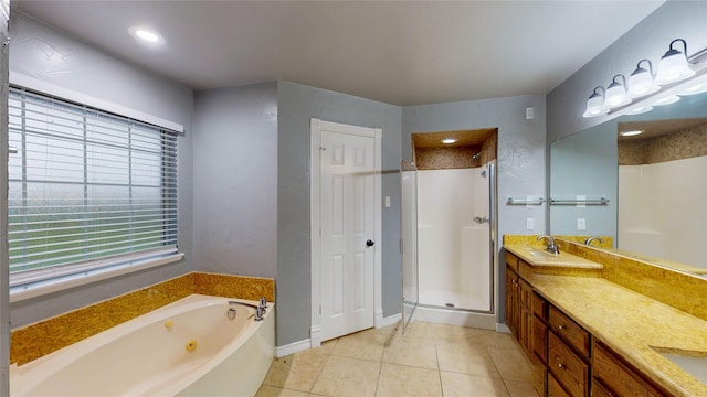 10020 Richard Cir, Forney, TX 75126 - full bath with a whirlpool tub, a sink, a shower stall, tile patterned floors, and double vanity